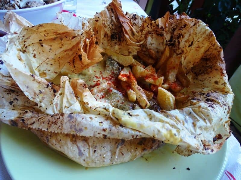 pork cooked in greeseproof paper from Synantisi taverna in Kissos