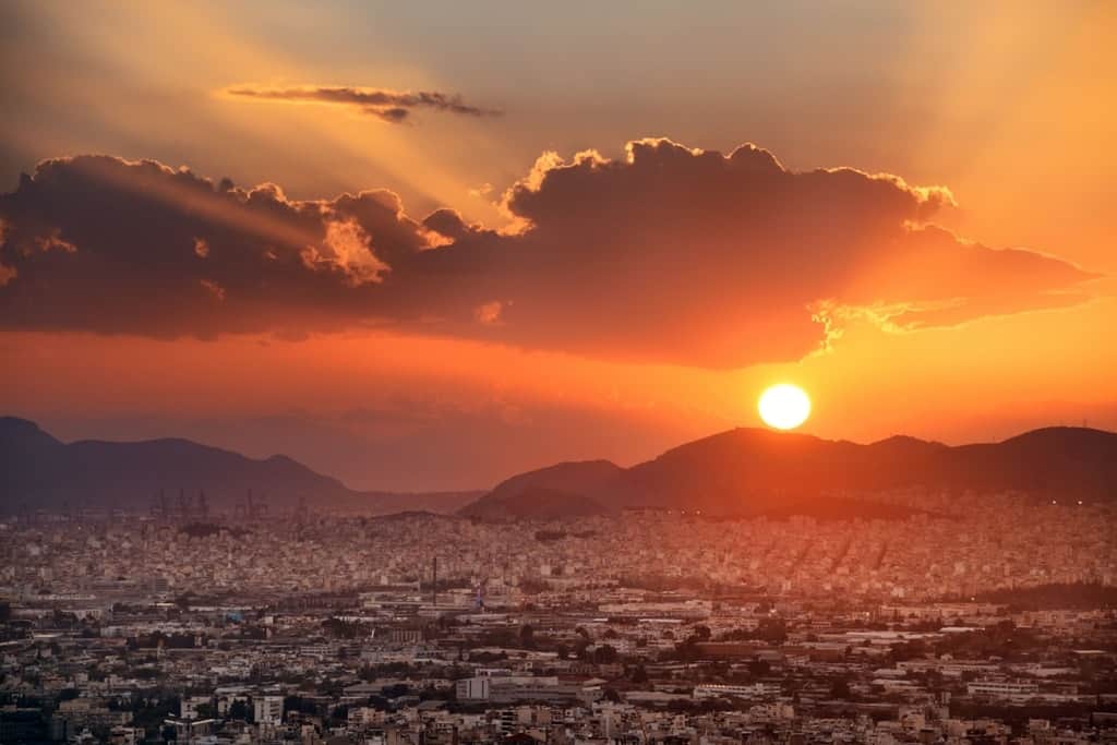 Athens skyline sunset viewed from Mt Lykavitos with Acropolis, Greece.
