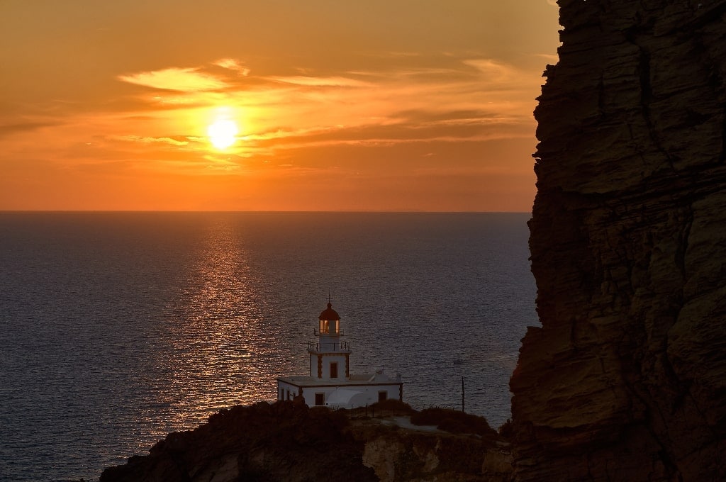 Sunset in the Akrotiri Lighthouse - best sunset spots Santorini